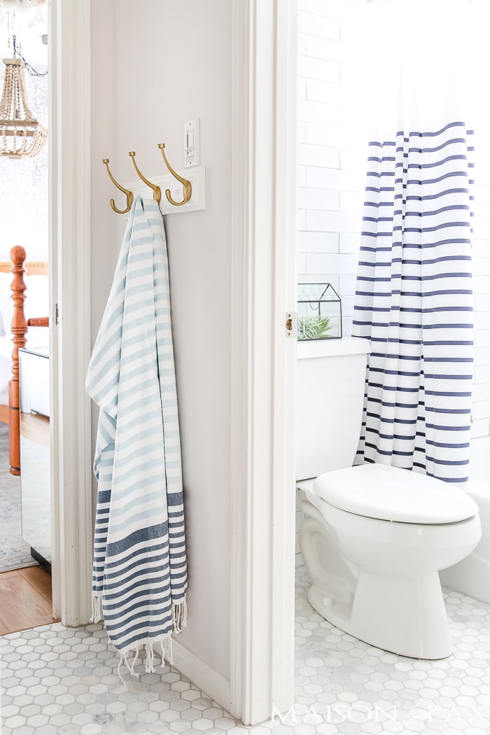 navy-and-brass-bathroom-with-white-subway-tile-1